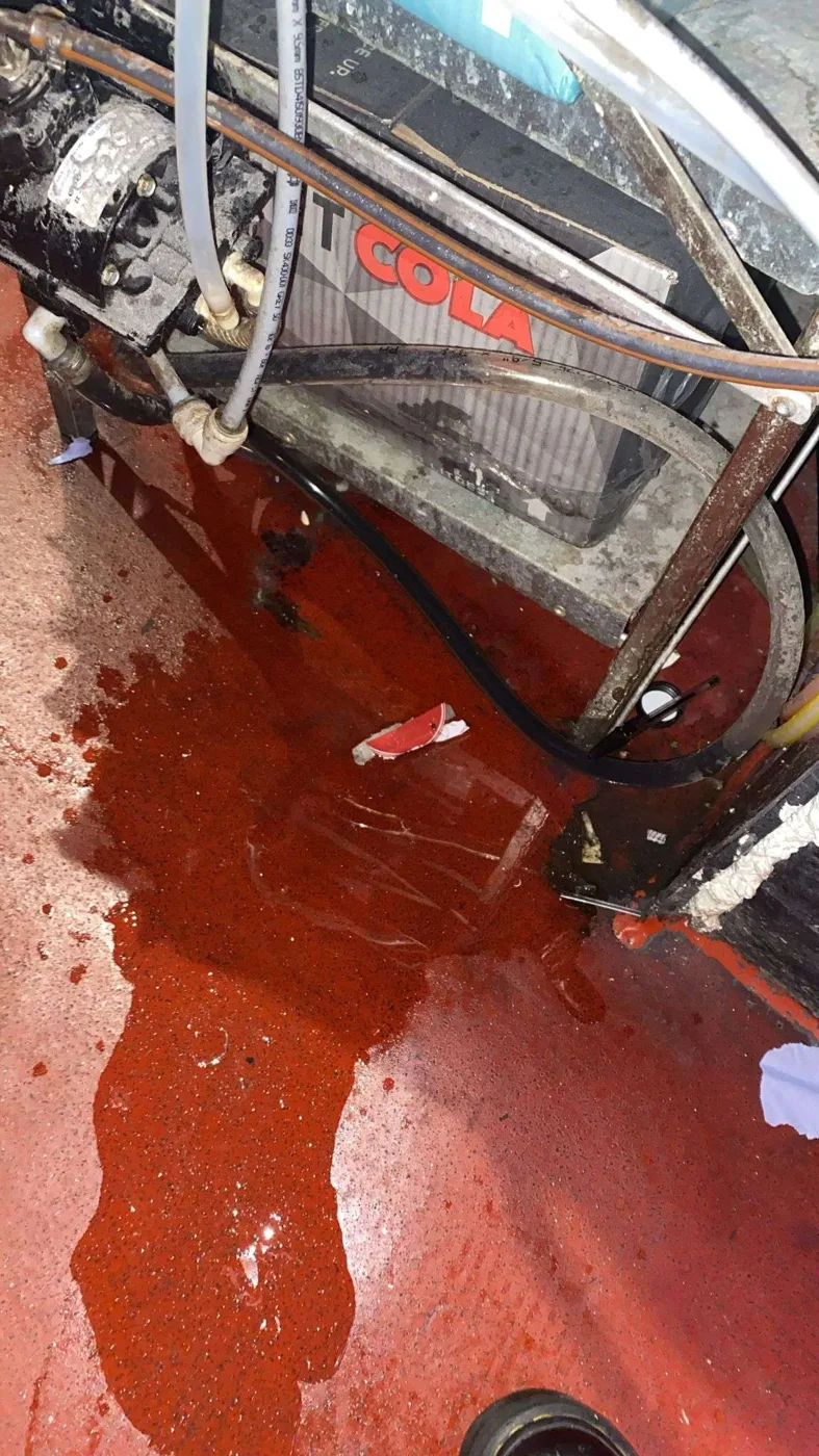 Water leaked onto floor beneath postmix unit